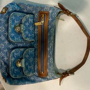 Louis Vuitton was a gift and not verified